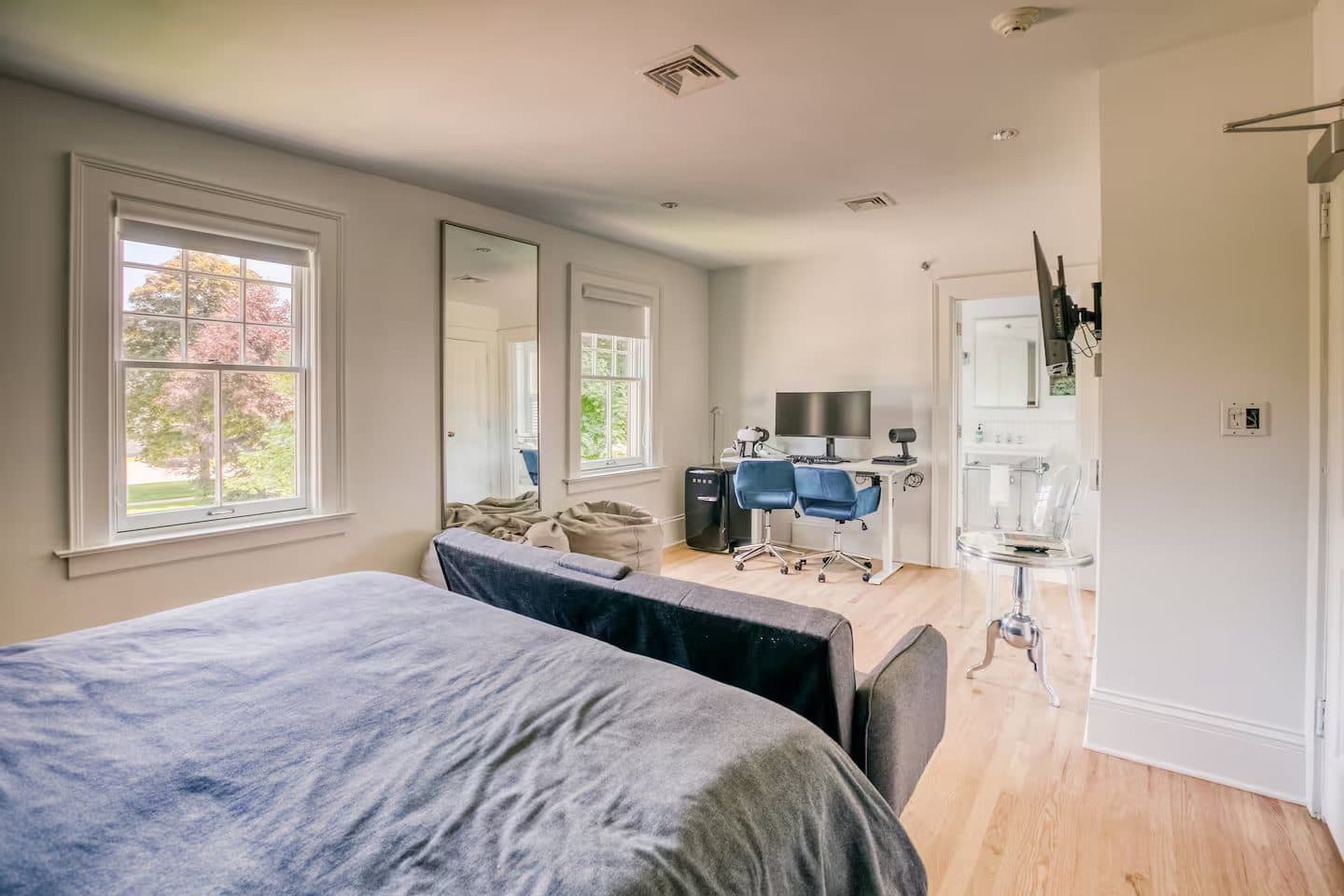 The Office Room — a calm bedroom with a built-in desk and workspace
